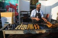 chef is preparing tikka kebab on the occasion of food festival