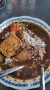 Rawon. Indonesian black beef soup in a plate