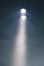 Ray of double pocket flashlight in smoke