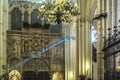 Ray of light entering through the rose window in Toledo Cathedral