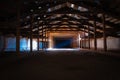 A ray of light penetrating through a window in a dark old abandoned attic