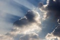 Ray of lights sunbeams break through thick clouds Royalty Free Stock Photo