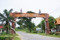 Village gate at road