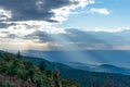 Rays of Light Shine through Clouds over Blue Ridge Mountains Royalty Free Stock Photo