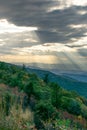 Rays of Light Shine through Clouds over Blue Ridge Mountains Royalty Free Stock Photo