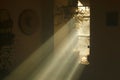 Rays of light coming through a window in an old country house Royalty Free Stock Photo