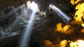 Rays of Light Entering a Cave Royalty Free Stock Photo