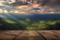 Rays of light pass through the clouds, Summer beautiful background with empty wooden table. Natural template landscape Royalty Free Stock Photo