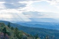 Rays of Light Shine through Clouds over Blue Ridge Mountains Royalty Free Stock Photo