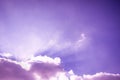 Rays of light shining up. Beam of light and the fluffy clouds. Pink purple sky with sun rays Royalty Free Stock Photo