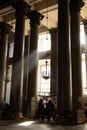 The rays of the sun breaking through the columns of the Kazan Cathedral.