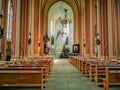 Rays of sun propagating through the window of the church in Druskininkai