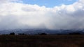 The rays of the sun through the rifts in the clouds in the mid-winter