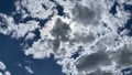 The rays of the sun shine through the cloud. Photo of a sunny sky. Royalty Free Stock Photo