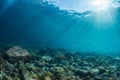 Rays of sunlight shining into sea, underwater view Royalty Free Stock Photo