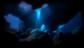 Rays of sunlight in underwater cave Royalty Free Stock Photo