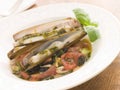 Razor Clams with Stewed Tomatoes Garlic and Olives