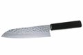 A razor sharp hand hammered Japanese Kitchen knife Royalty Free Stock Photo
