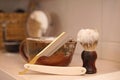 Razor, shaving brush and foam dish Royalty Free Stock Photo