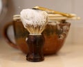 Razor, shaving brush and foam dish Royalty Free Stock Photo