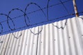 Razor wire and aluminum fence