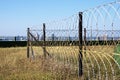 Razor Wire Security Fence Surrounding Protected Structure