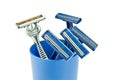 Razors in blue cup Royalty Free Stock Photo