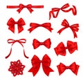 Set of realistic red satin ribbon bows Royalty Free Stock Photo