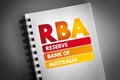 RBA - Reserve Bank of Australia acronym on notepad, business concept background Royalty Free Stock Photo