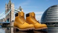 Yellow Work Boots in London with Tower Bridge and City Hall Royalty Free Stock Photo