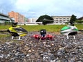RC Helicopters, drone on the ground side by side