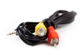 RCA composite video cable curled up jack to yellow and red chinch short cord, isolated on white, background, cut out. Simple retro Royalty Free Stock Photo