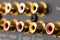 RCA sockets of audio surround receiver amplifier. Macro shot Output audio connectors