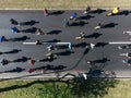 23rd of April 2023, Belgrade, Serbia. Shot of a group of young men running a marathon. Aerial drone photo.