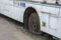 23rd February, 2021, Baraipur, West Bengal India: A damaged broken useless bus standing road side as a scrap