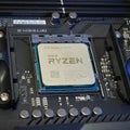 3rd Gen AMD Ryzen 9 3900X CPU mounted on a motherboard AM4 socket - close up