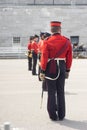 Re-enactment soldiers standing at attention in a parade square