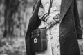 Re-enactor Wears Historical German Nurse Paramedic Of World War II Uniform With First Aid Kit. Photo In Black And White Royalty Free Stock Photo