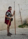 Re-enactors dressed as Roman Legionnaires, wait to pose with Tourists at the gates to the Diocletian Palace