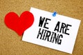 We`re Hiring Word on Office Workplace Royalty Free Stock Photo