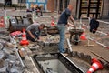 Re-paving cobblestone street. Road repair in Dinan, france. Royalty Free Stock Photo