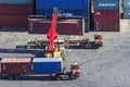 Reach stacker - a container handling loader at the port, loads a container onto a truck