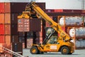 Reach stacker moving cargo container port