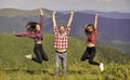 Reached top. Happy cheerful friends celebrate reaching top mountain. Feeling freedom. Man and girls happy emotional Royalty Free Stock Photo