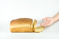 Reaching for bread. Royalty Free Stock Photo