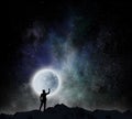 Reaching the moon. Mixed media Royalty Free Stock Photo