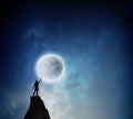 Reaching the moon. Mixed media Royalty Free Stock Photo