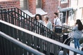 Reaching the top takes continuous and consistent progress. a group of businesspeople walking up the stairs in a modern Royalty Free Stock Photo