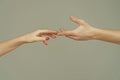 Reaching touching couple hands. Reach hand. Sensual touch fingers. Two hands trying to touch. Male and female hands