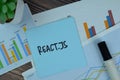 React.JS write on sticky notes isolated on Wooden Table